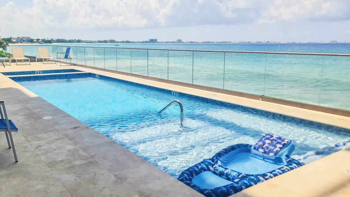 Northwest Point Condo | Luxury Ocean front SeaDreams 2 with 7 Mile Beach Views, rooftop, pool, Spa