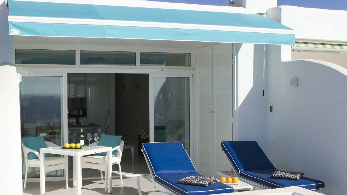 Puerto del Carmen Apartment | Luxury one bedroom apartment, private terrace, ocean views, full UK TV, WiFi