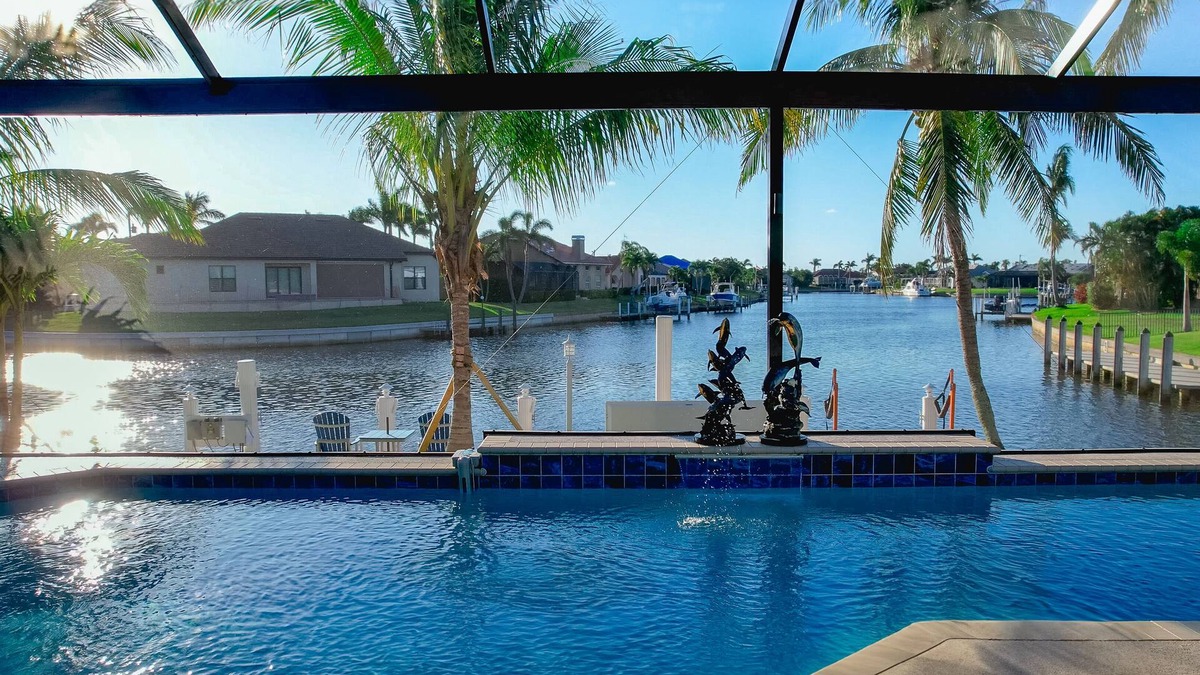 Burnt Store Isles House | Luxury Tropical long waterfront view w/bikes,kayaks,golf clubs,beach gear incl.