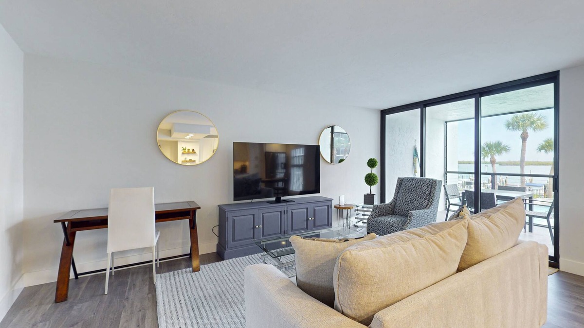 Marco Island Condo | Luxury waterfront condo with shared pool, hot tub, and a tennis court