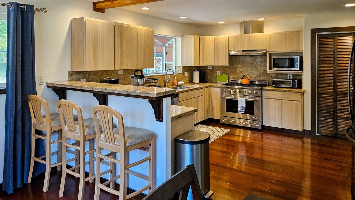 Cleone House | Magical estate & detached guest suite with hot tub, game room, pond & playset
