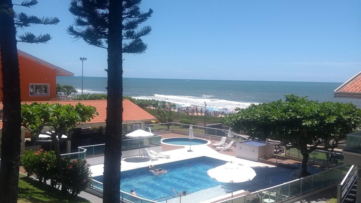 Barra Velha Apartment | Magnificent apartment feet in the sand gated community by the sea