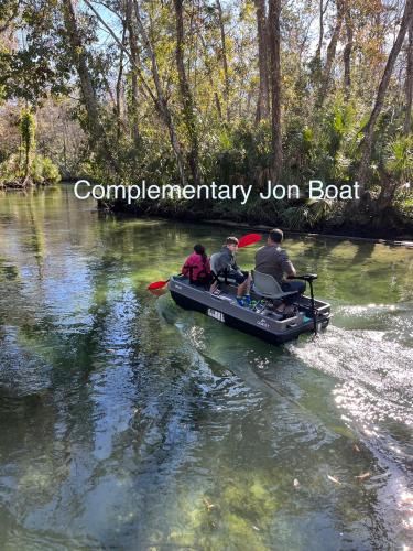 Weeki Wachee Gardens Villa | Main River Retreat hot tub, canoe with trolling motor