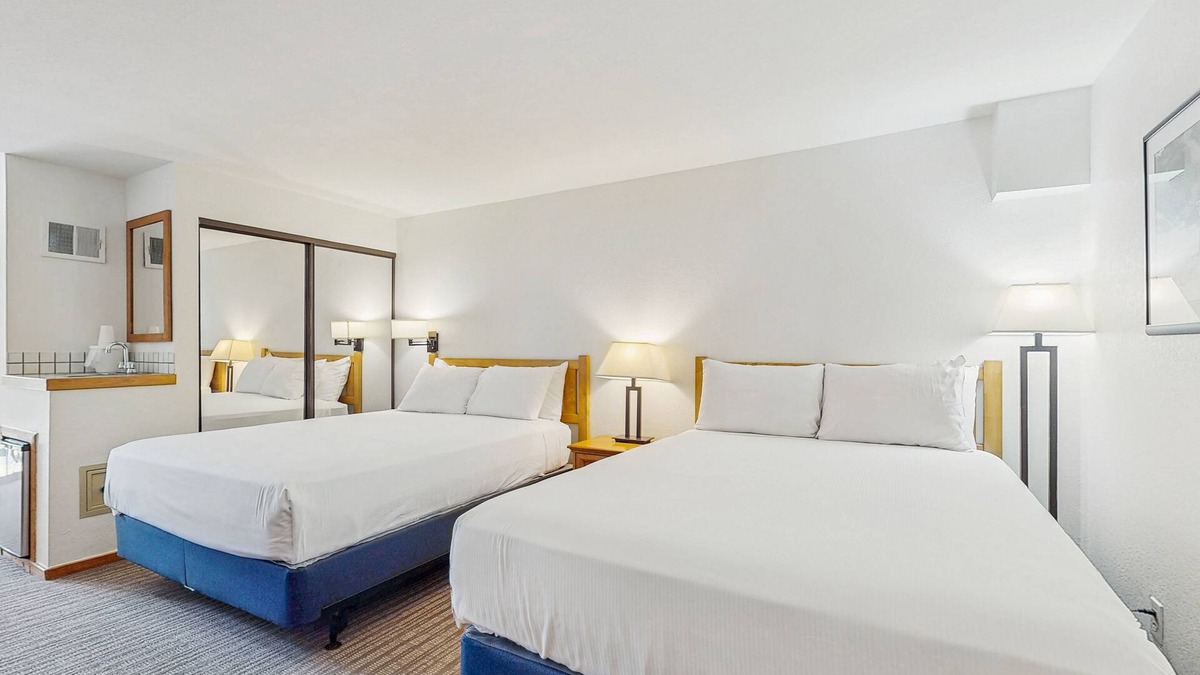 West End Apartment | Main Street room - hot tub & pool - walk to lifts, dog-friendly, balcony