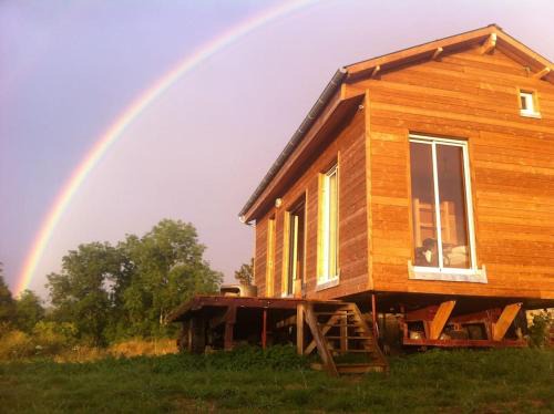 Nuits House | Maison en bois dans un pré