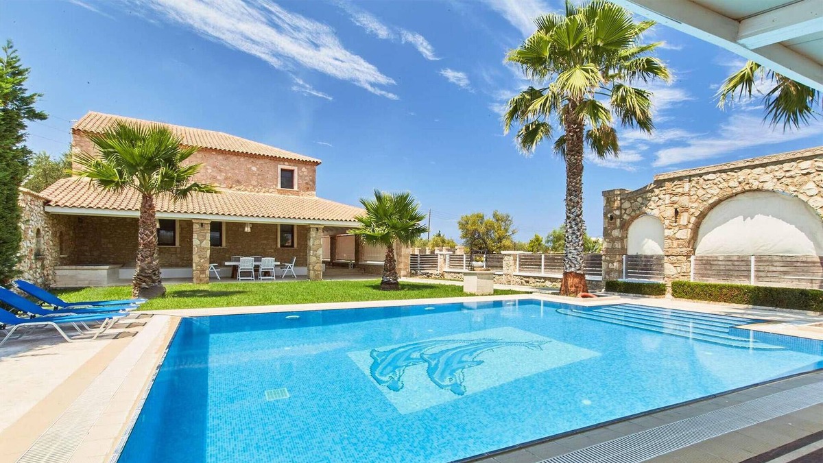 Drosia House | Make the most of the outdoor life at this beautifully designed villa with its stunning pool, covered