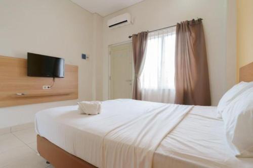 Kuningan House | Mango Suites Kuningan