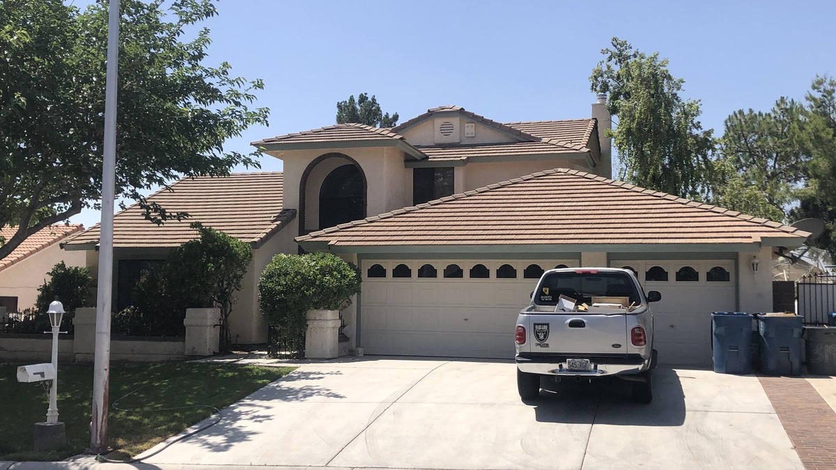 Paradise House | Master Bedroom and bath in a Vegas home with pool & 7 minutes to the stripn