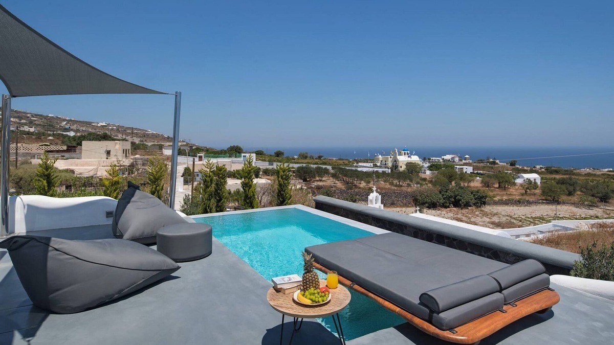 Fira Villa | Masterful Santorini Villa | Villa Zacharias | 4 Bedrooms | Outdoor Dining Area.