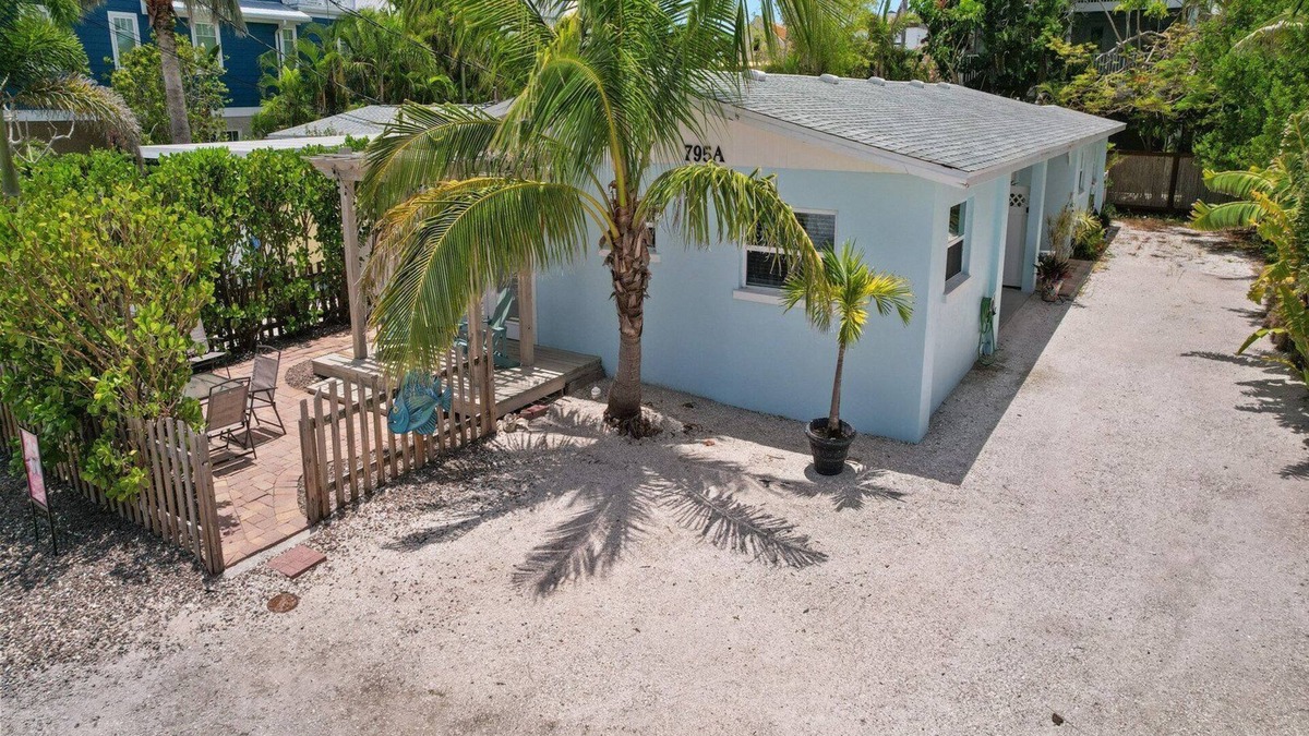 Anna Maria House | McBean Point: Dog Friendly! Walk to Bean Point! by Anna Maria Life Vacation Rentals