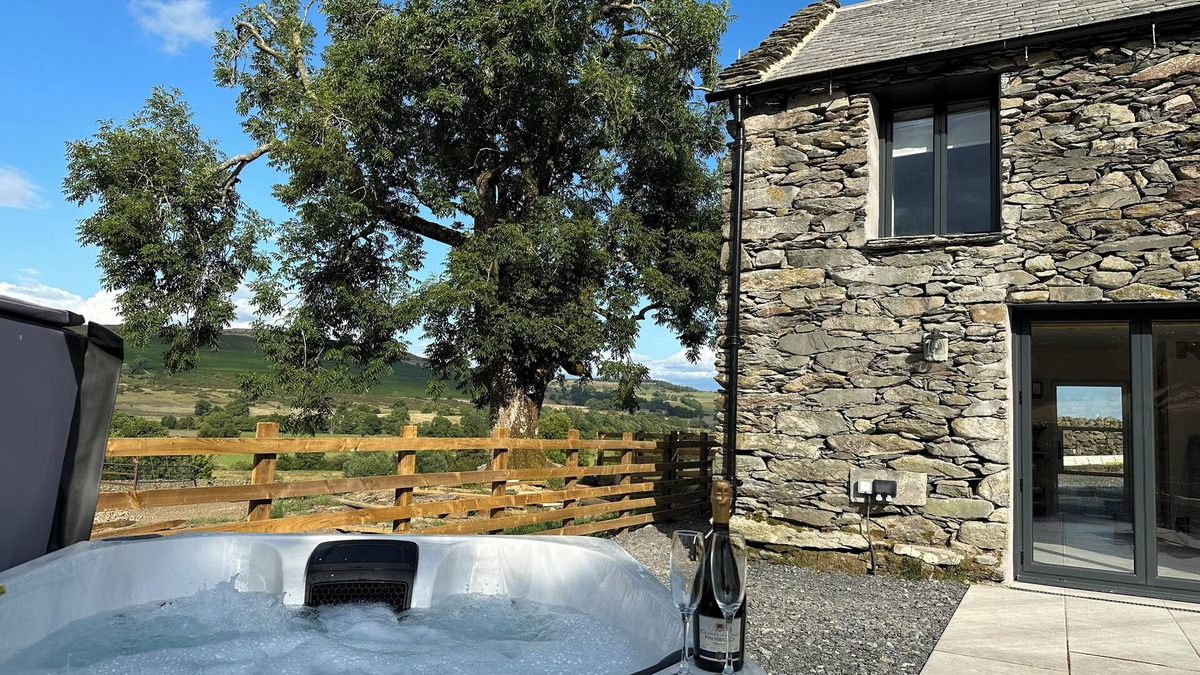 Penrith House | MEADOW SYKE BYRE, pet friendly, with hot tub in Bampton, Cumbria