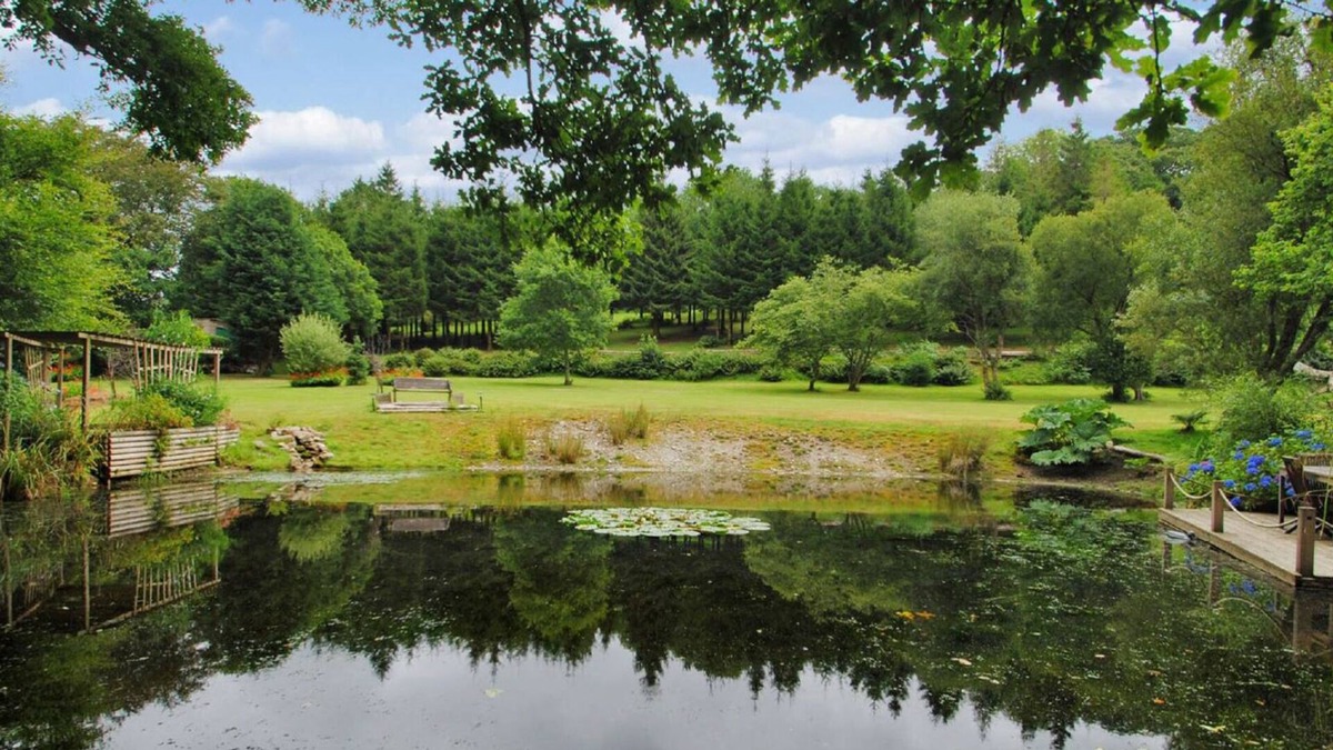 Mount Cottage | Millpool Lodge peaceful haven with 3 acre stunning gardens waterfalls and hottub