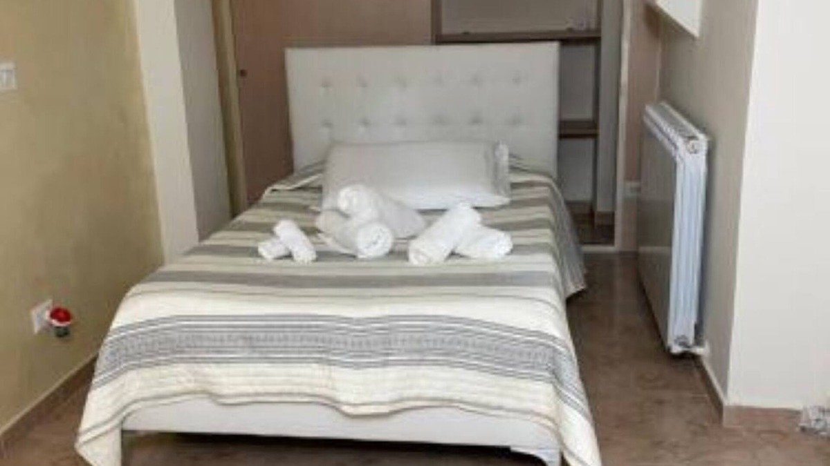 Cosenza House | Mini-apartment in the center of Cosenza placed between the old and the "new" city.
