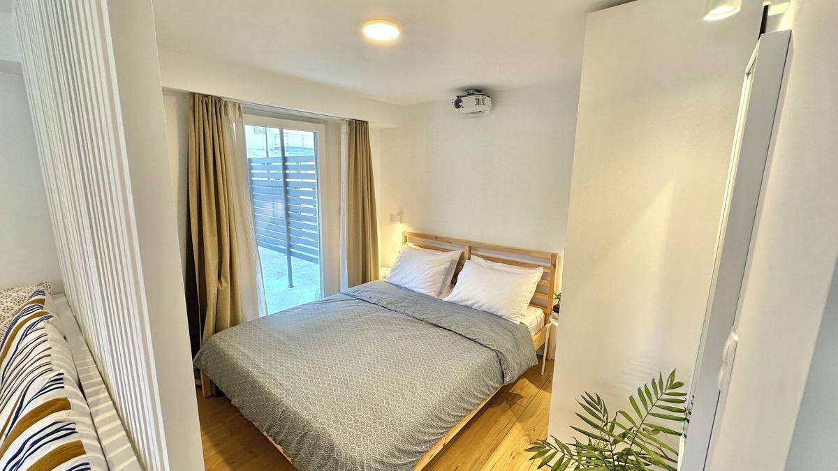 Olymbiaki Akti Apartment | Minimalist Seaside Apartment with Patio and Parking - Blue Zone Homes