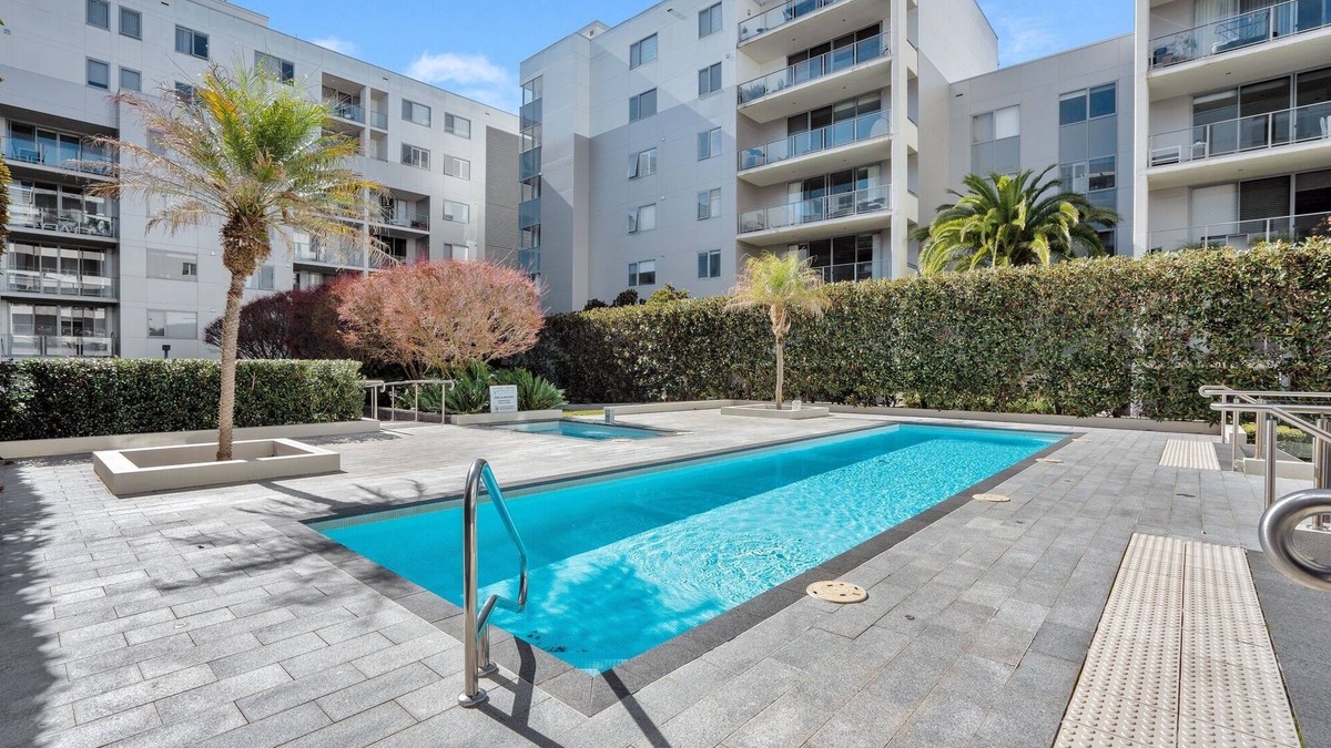 Reid Apartment | Modern 1-Bed Unit with Pool Views and Balcony