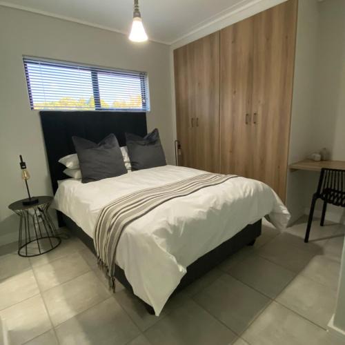 Boksburg Apartment | Modern 1BR Near OR Tambo, Wi-Fi, Secure Parking
