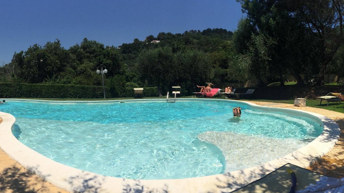 Pugliola Apartment | modern and luxurious penthouse in Lerici with sea view terraces, garden and pool
