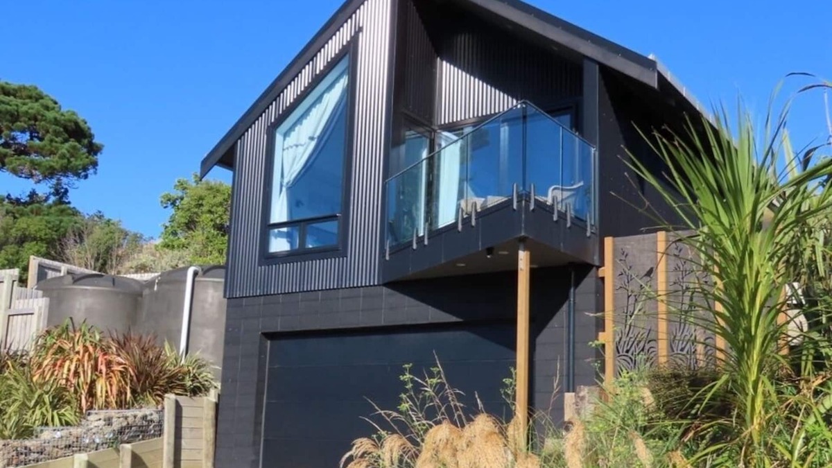 Castlepoint Apartment | Modern apartment with stunning views of Lighthouse and short walk to beach.