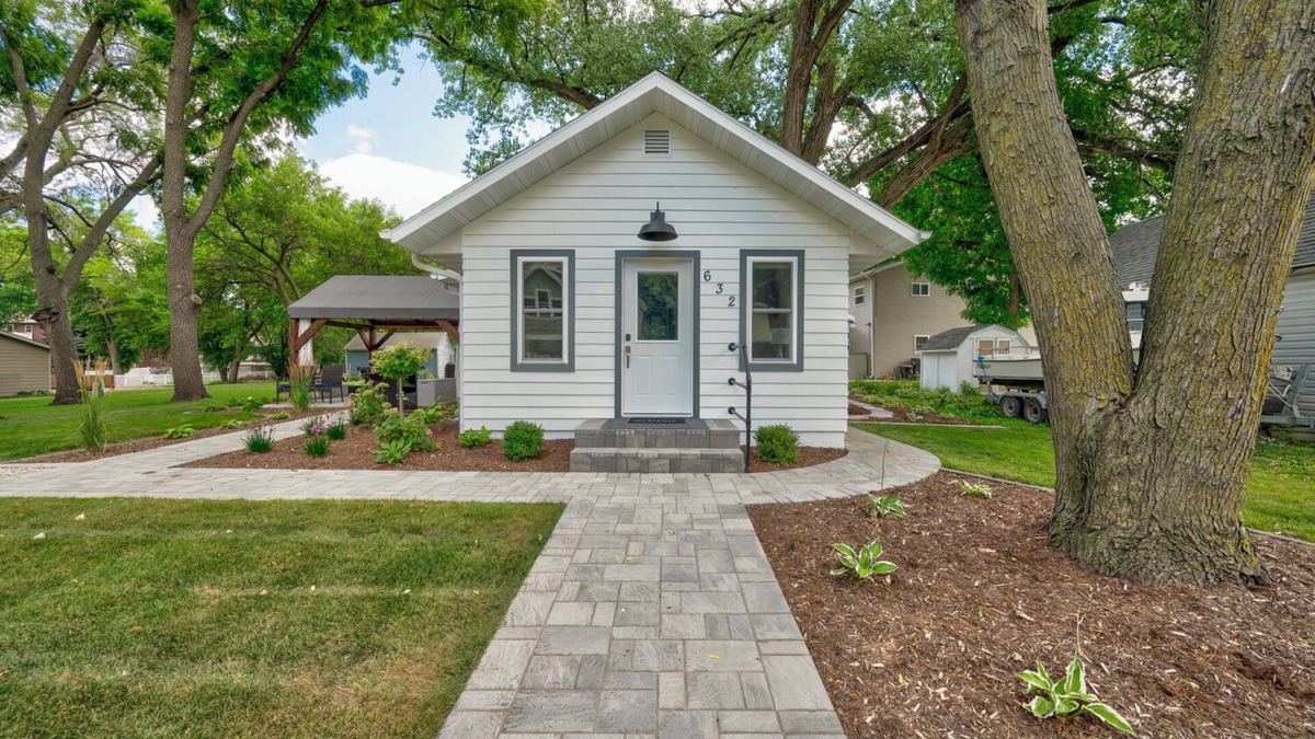 Milford House | Modern Bungalow Retreat: Walk to Arnolds Park, Relax with Fire Pit & Pergola