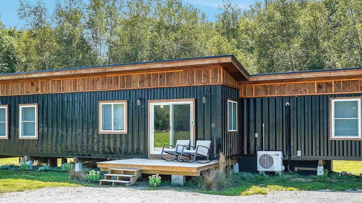 Rumney Cabin | Modern Container House with mountains, river, and privacy.