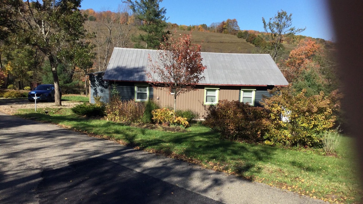 Black Creek Cottage | Modern cottage located in 250 private acres Pond Fishing Hiking Fire Pit