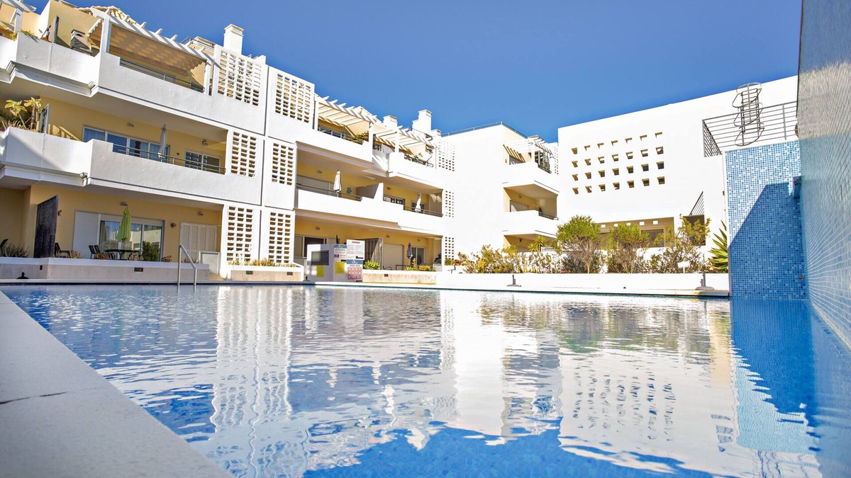 Cabanas Apartment | Modern, cozy apt with pool access