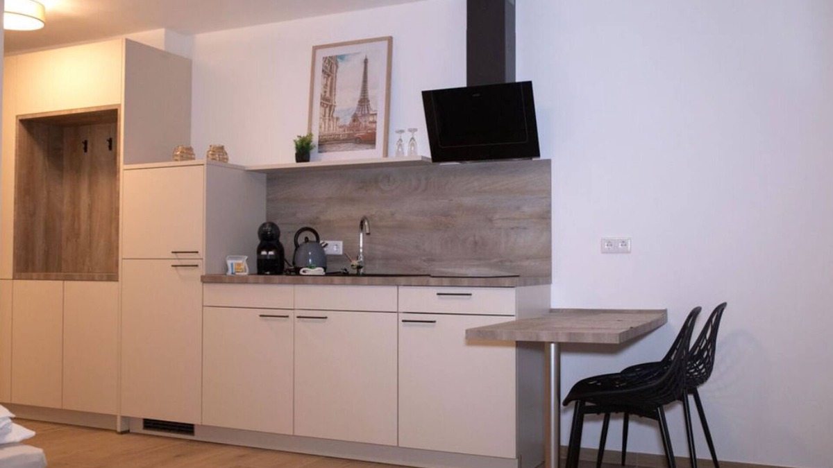 Jollenbeck Condo | Modern cozy purple apartment