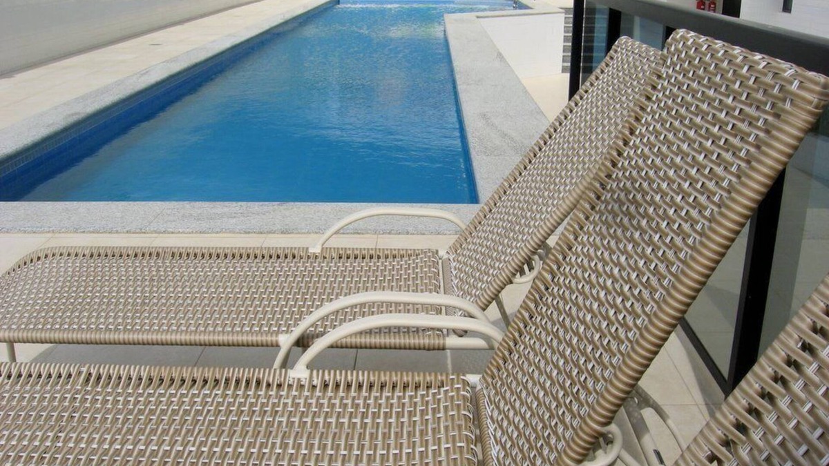 Armacao Apartment | Modern fully-furnished apartment with swimming pool, gym and game room.