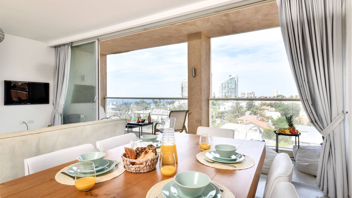 Herzliya Pituach Apartment | Modern Gem with Stunning Balcony by Sea N Rent