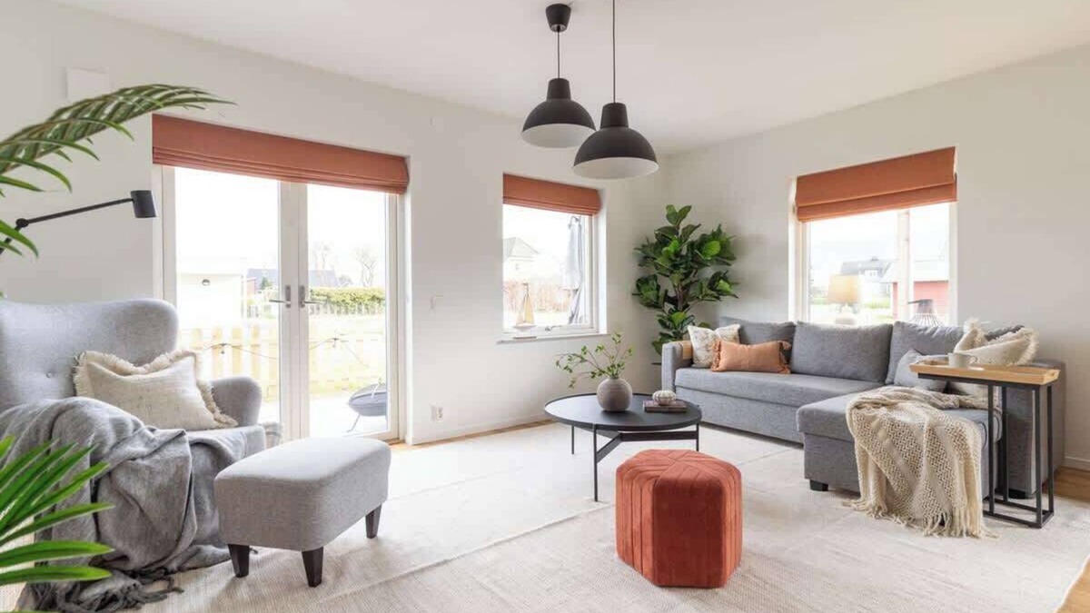 Bastad Condo | Modern Ground Floor Corner Flat with Rustic Patio