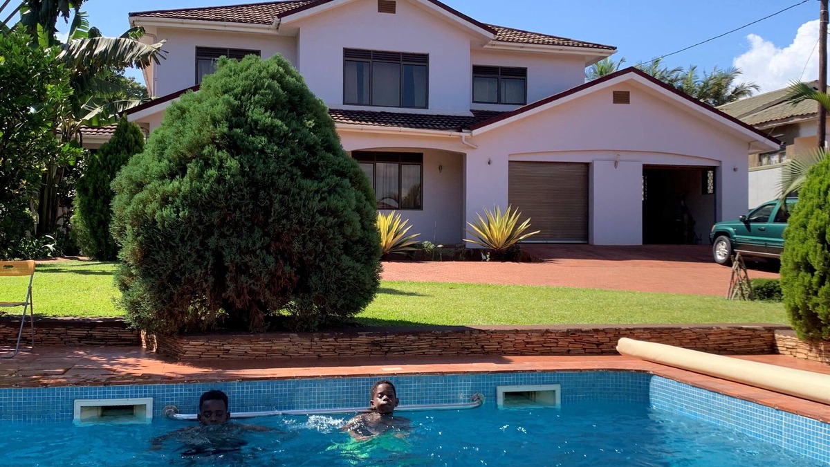 Kireka House | Modern home with a private swimming pool