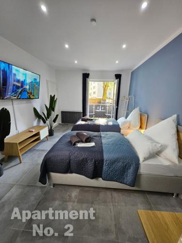 Moers Apartment | Modern Homes - Voll ausgestatte Wohnung - Balkon - Hotelbetten - 4K TV - WLAN