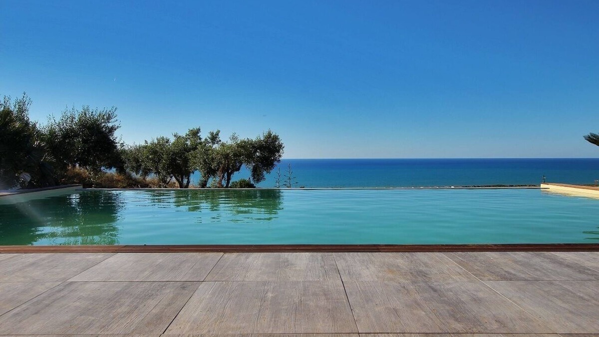 Campofelice di Roccella Villa | Modern property with Private Golf Practice, Private Pool, Garden, WiFi, Sea VIew