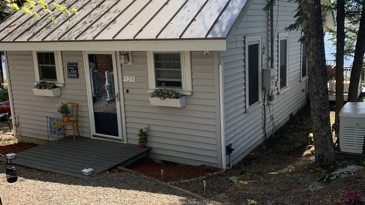 Oakland Cottage | Modern Lakefront Camp on East Pond - cozy fire pit, 3 kayaks, canoe