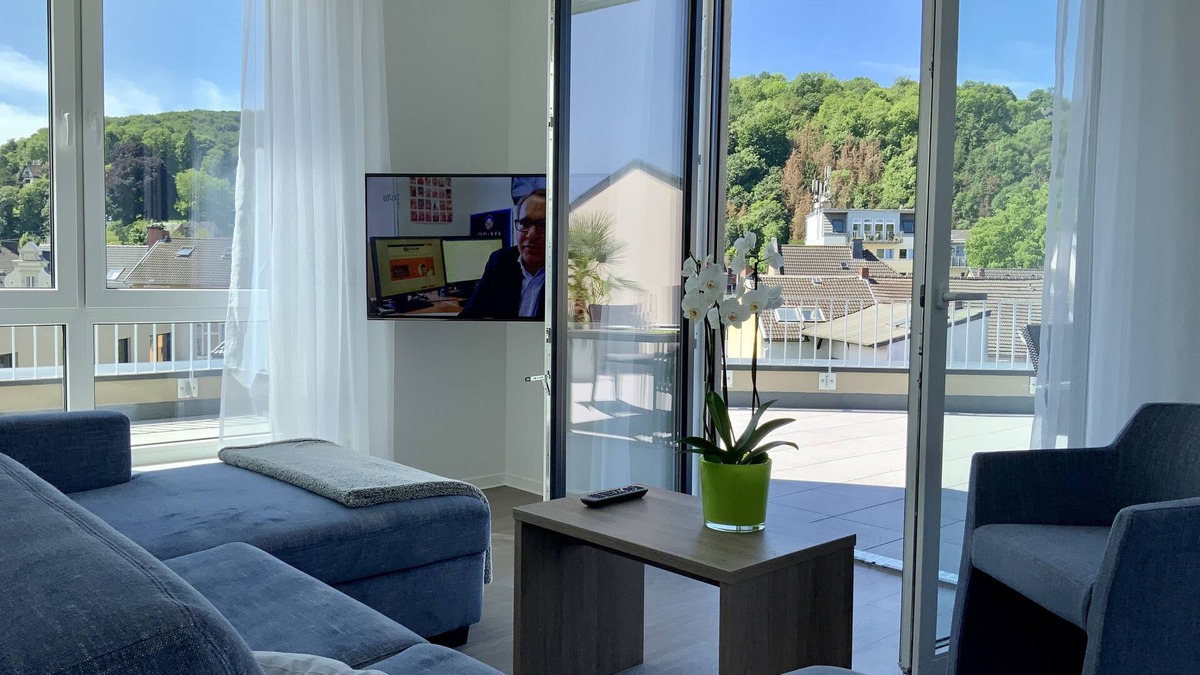 Remagen Apartment | Modern penthouse apartment with terrace over the roofs of Remagen
