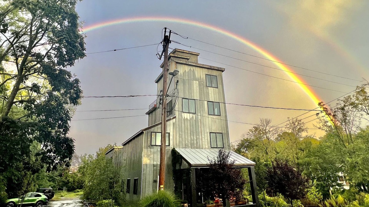 Warwick Apartment | Modern penthouse suite in a restored grain tower with private roof deck.