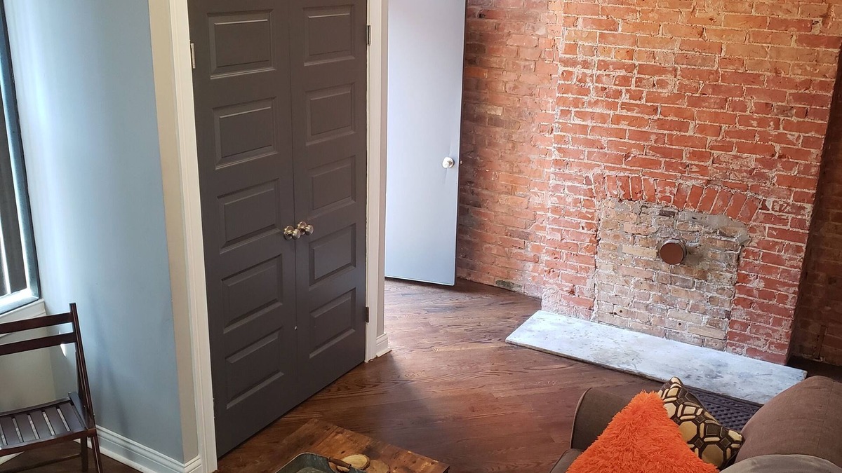 Corryville Apartment | Modern rustic split-level with private balcony