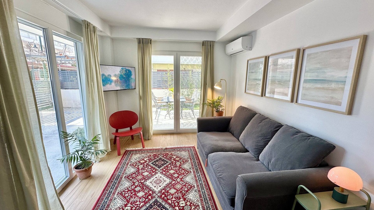 Olymbiaki Akti Apartment | Modern Seaside Home with Private Patio + Parking - Blue Zone Homes