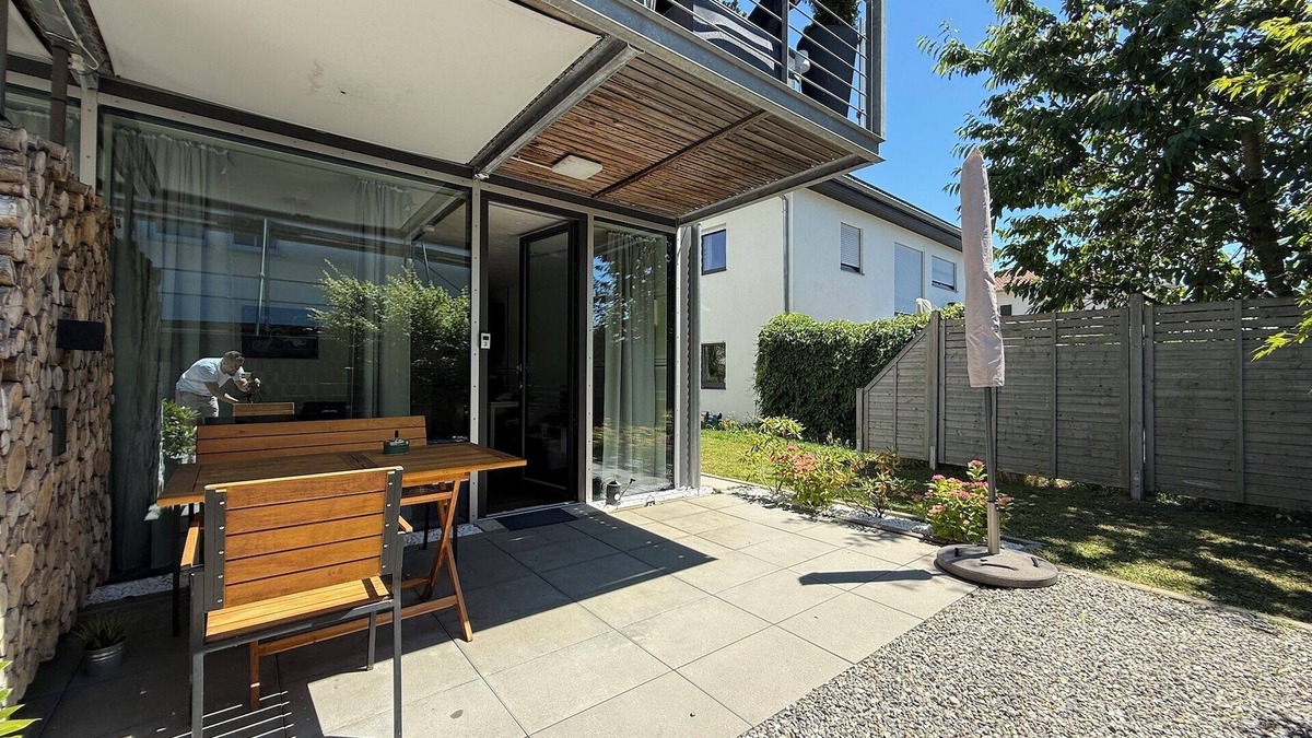 Stetten Apartment | Modern See und Mehr Apartment 3 with covered terrace and garden view