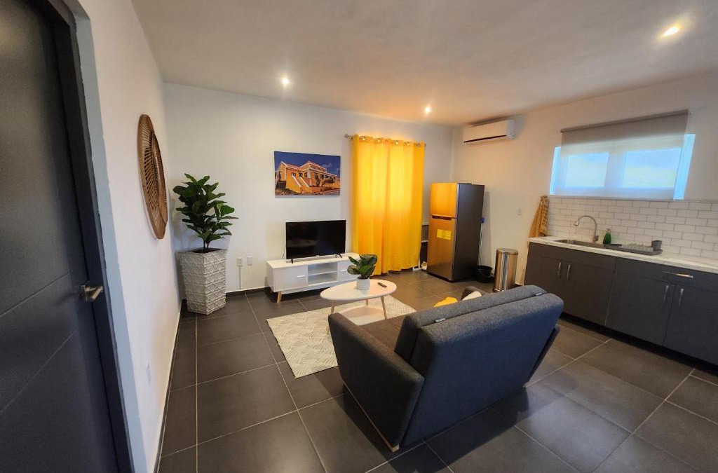 Tera Kora Apartment | Modern sunshine yellow apartment with nature views