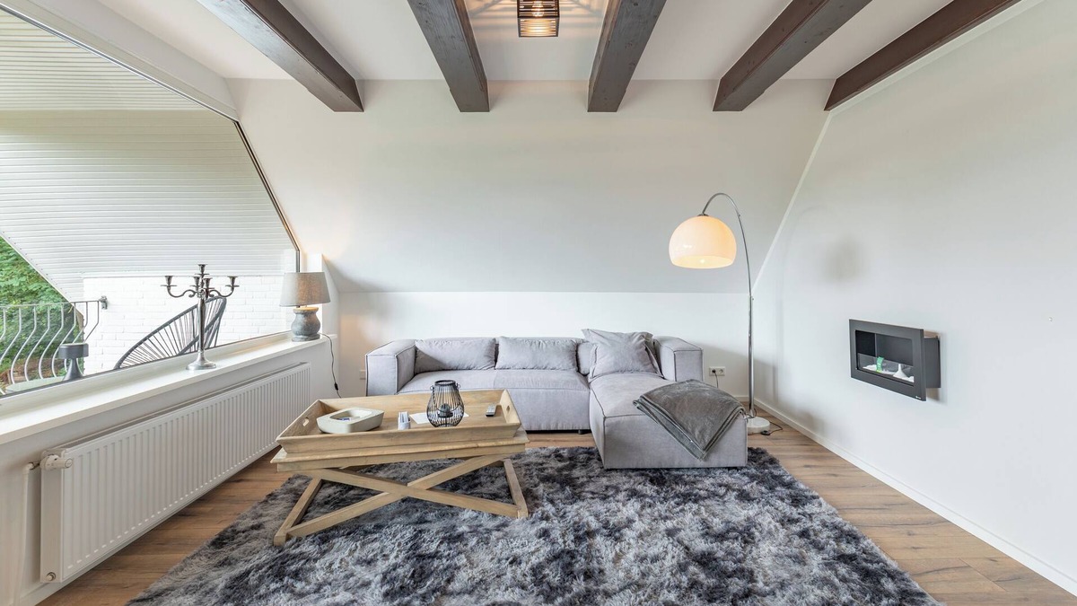 Breklum Apartment | Modern vacation apartment Heimathafen with balcony and garden view in the village of Breklum