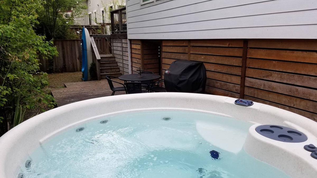 Vacation Beach House | Modern Vacation Beach Gem by the River w/Hot Tub - 4 queen beds