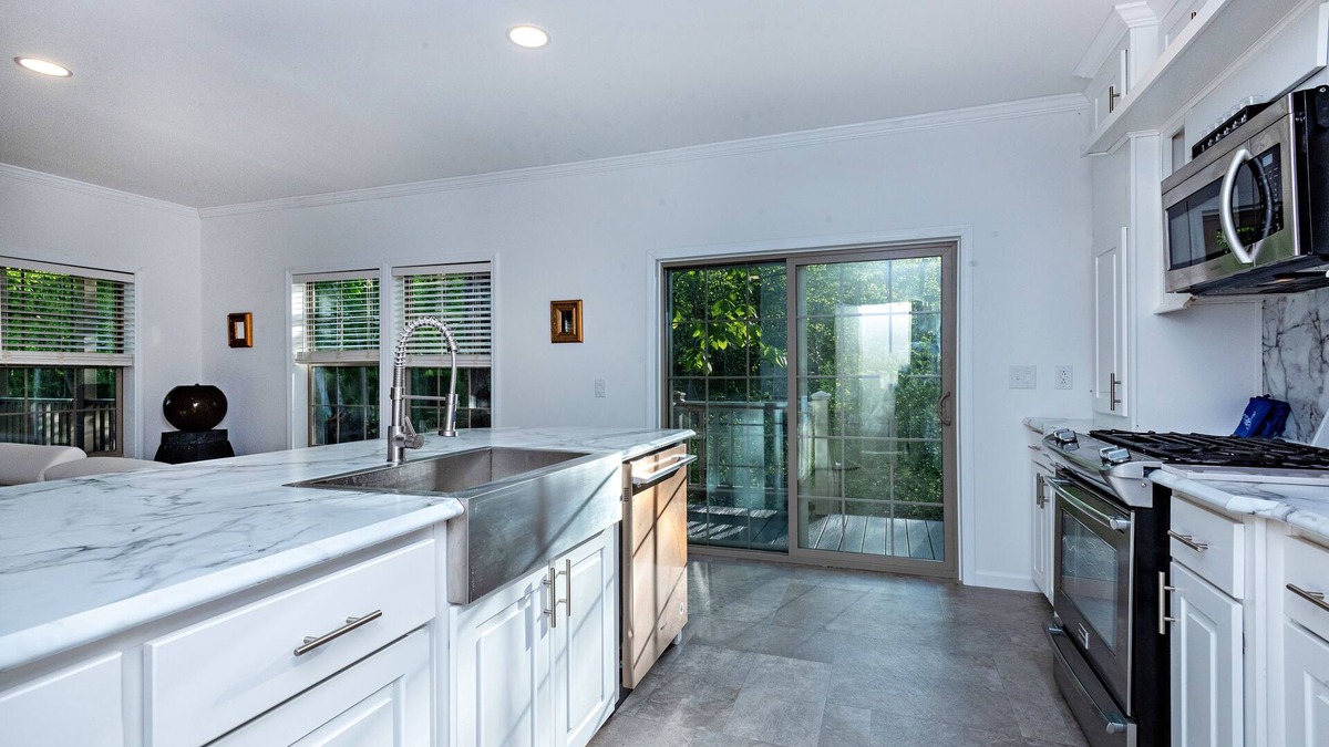 Galloway House | Modern waterfront fireplace in bedroom/bath jetted tub walk in shower no steps