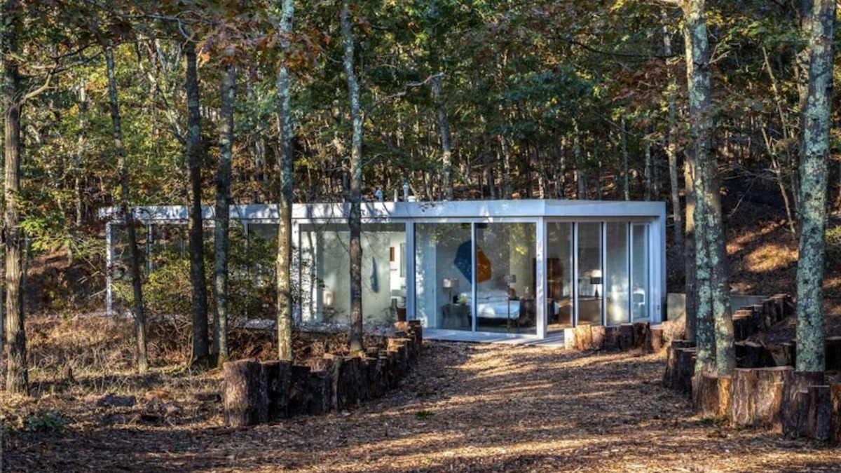 Water Mill House | Modernist Glass House nestled in tall pines and nature offering total privacy