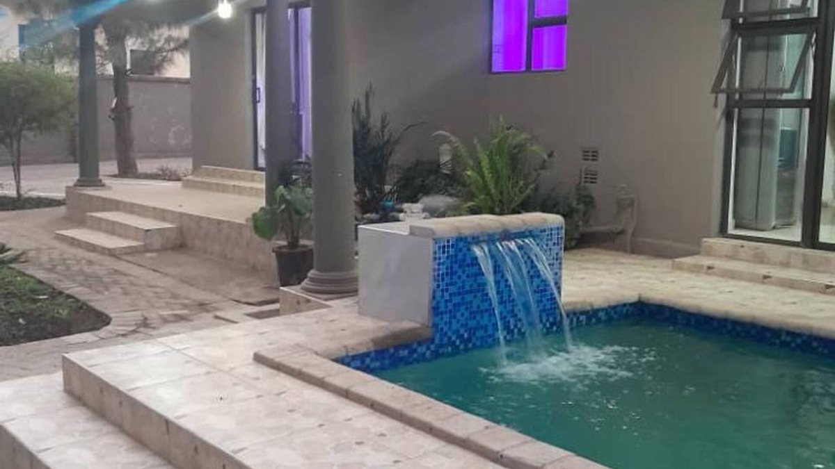 Kadoma Apartment | Modernly Furnished Standard Room With Queen bed - 2220
