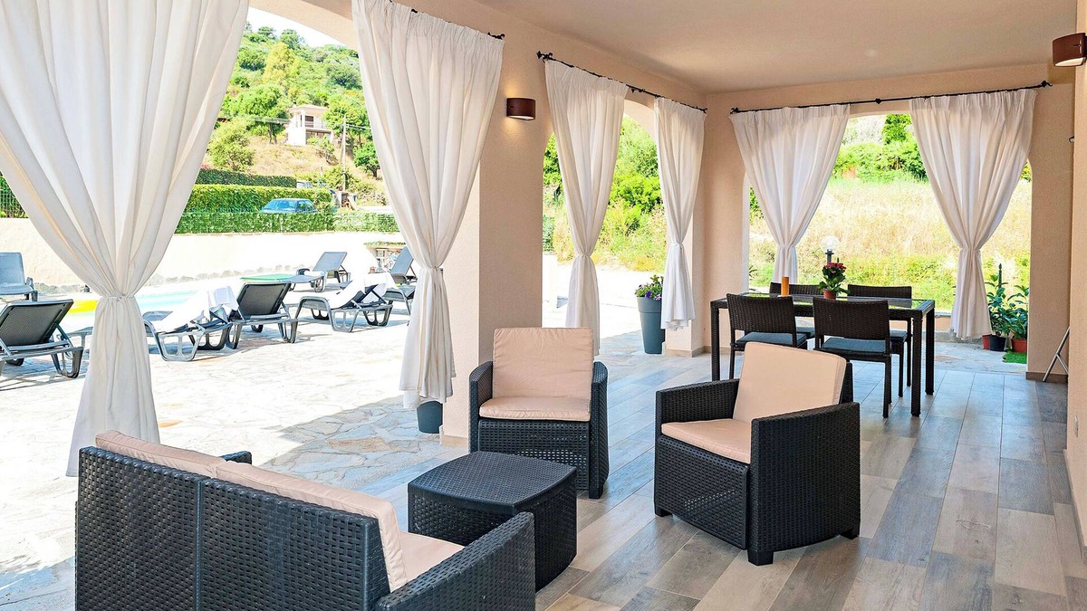 San Teodoro House | MOLAROTTO CAMERE CON ANGOLO COTTURA