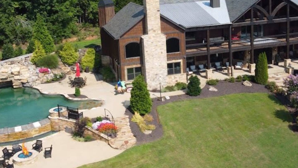 Cleveland House | Mountainside Manor l Custom pool & movie theater!