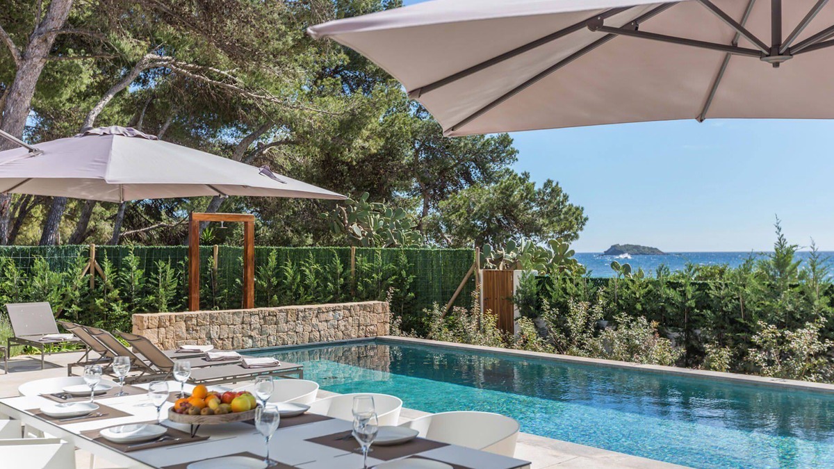 Cala Pada Villa | My Rental Homes - Villa Crozet nfinity pool directly in front of the sea