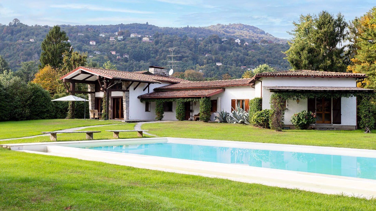 Solcio Villa | My Rental Homes - Villa Brin with tennis court, private sandy beach and dock