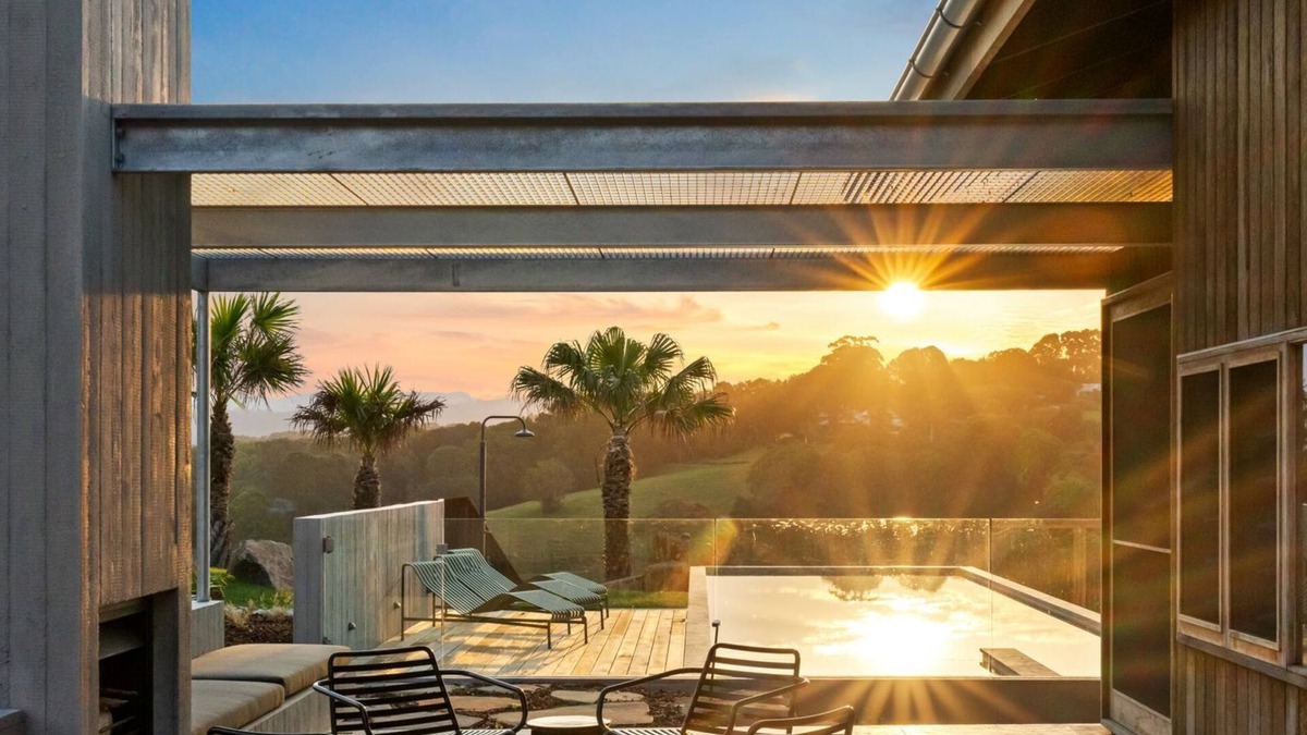 Myocum House | Myocum Ridge Farm - A winding driveway, cows, blue skies, manicured lawns, glittering pool